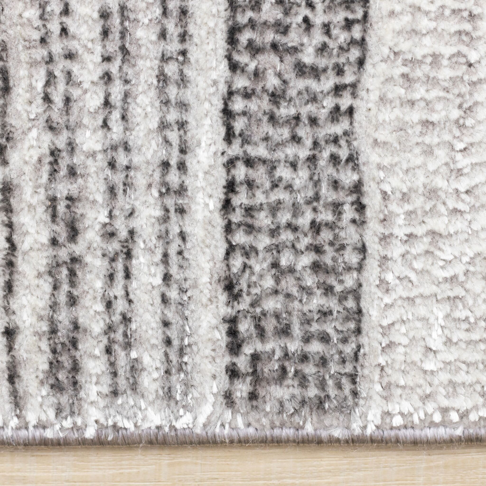 Zola 5'3" x 7'7" Patterned Rows Area Rug - Grey, White, Black - Image 4